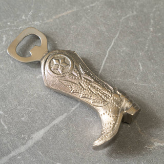 Nickel etched cowboy boot bottle opener showcasing a stylish Western design, perfect for opening beverages.