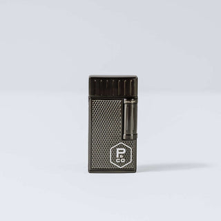 Custom Colibri Julius lighter featuring a sleek design and textured finish, perfect for lighting cigars.