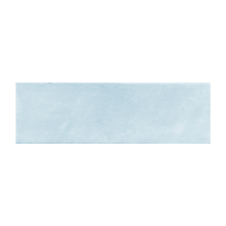 Candy 2x6" porcelain tile in a soft blue color, featuring a glossy, textured surface ideal for elegant spaces.