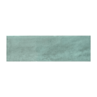 Candy 2x6" porcelain tile in a vintage brick style with a refined textured glossy surface.