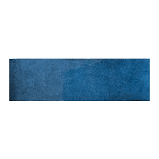 Candy 2x6" porcelain tile in a rich blue hue, featuring a glossy texture and vintage brick-inspired design.