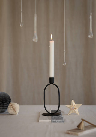 Eternal Oval Candle Holder with white candle, embodying harmony and balance in a minimalist design.