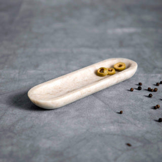 Granada Short Trough, a hand-carved grey marble serving dish, perfect for olives or as a unique catchall.