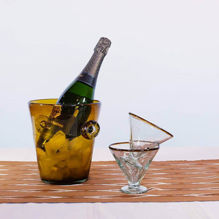 Amber Rim cocktail glass set with a champagne bucket, ideal for festive gatherings and sustainable drinkware.