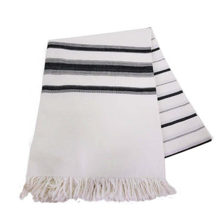 Handwoven black and white tablecloth made of 100% cotton, perfect for dining, picnics, and beach use.