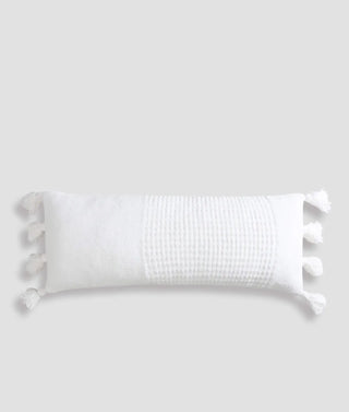Braided Pom Pom Lumbar Pillow with removable cover, elongated shape, and soft memory foam filling, OEKO-TEX® certified.