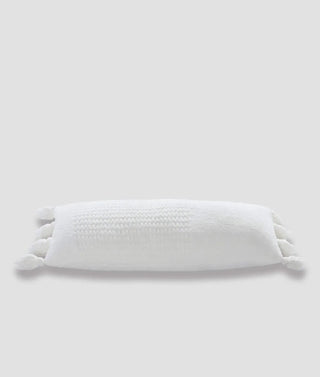 Braided pom pom lumbar pillow with white removable cover and memory foam for comfort, OEKO-TEX® certified.