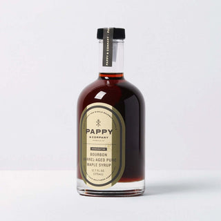 Pappy Van Winkle bourbon barrel-aged pure maple syrup in a glass bottle with elegant label.