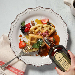 Delicious waffles topped with fresh berries and Pappy Van Winkle Bourbon Barrel-Aged Pure Maple Syrup.