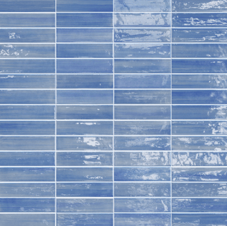 Vietri-inspired Dolcevita 2.5" x 10" blue tile collection showcasing elegant craquelure effects and traditional patterns.