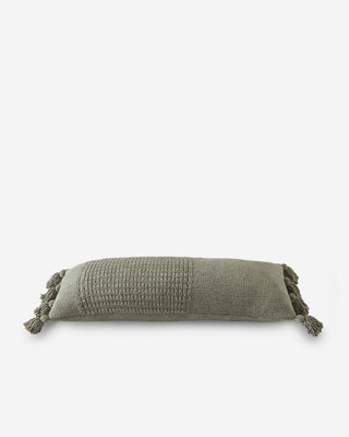 Braided pom pom lumbar pillow in green, featuring a memory foam design with removable cover, OEKO-TEX® certified.