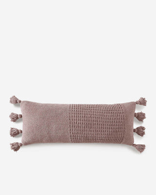 Braided pom pom lumbar pillow with removable cover, elongated design and OEKO-TEX® certified memory foam for comfort.
