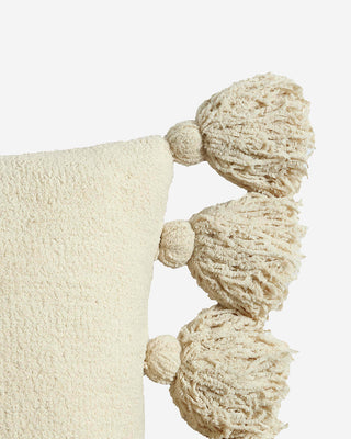Soft microfiber pom pom throw pillow with fuzzy tassels, ideal for cozy home decor, OEKO-TEX® certified.