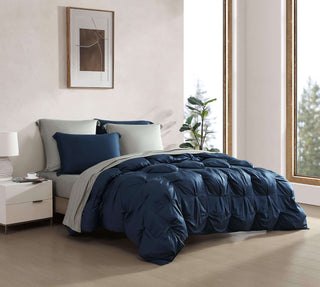 Premium Bamboo Bubble Comforter Bundle in navy blue on a cozy bed with stylish shams and natural light.
