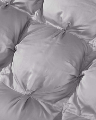 Close-up of a plush, silky-smooth Premium Bamboo Bubble Comforter, showcasing its soft texture and puffy design.