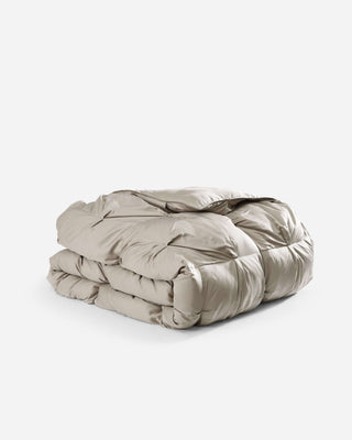Premium Bamboo Bubble Comforter Bundle folded, showcasing its soft, breathable fabric and sustainable materials.