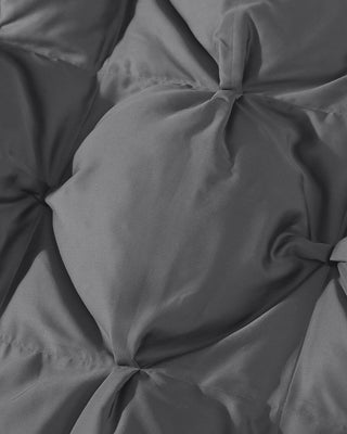 Close-up of premium bamboo bubble comforter showing plush, puffy texture and smooth fabric for ultimate comfort.