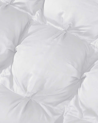 Close-up of the premium bamboo bubble comforter showcasing its soft, plush tufted design and silky texture.