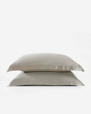 Pair of premium bamboo shams in a neutral hue, offering silky-smooth comfort for a cozy bedtime experience.