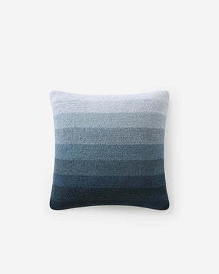 Ombre throw pillow in shades of blue, featuring memory foam filling and removable, machine washable cover.