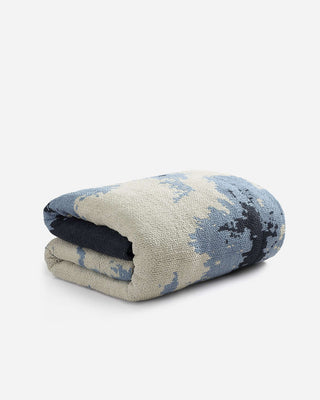 Double Snug Pixel Comforter folded, featuring modern multi-tone colors and soft textured fabric.