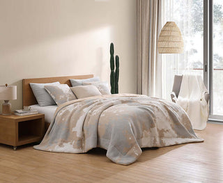 Double Snug Pixel Comforter in a cozy bedroom, featuring multi-tone colors, modern design, and warm, fluffy layers.