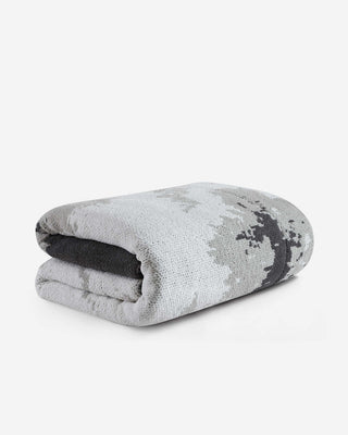 Folded Double Snug Pixel Comforter in modern design with multi-tone gray colors for added warmth and coziness.