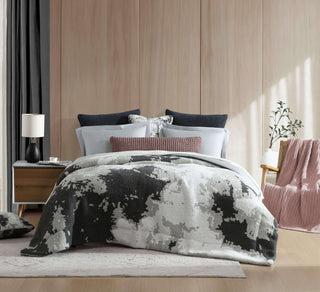 Double Snug Pixel Comforter in a stylish bedroom, featuring modern design, fluffy texture, and multi-tone color palette.