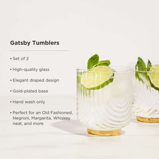 Gatsby Tumblers set of 2 in high-quality glass with elegant draped design and gold-plated base, perfect for classic cocktails.
