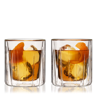 Double-walled rocks glasses set of 2 with dark cocktails and orange garnish, ideal for savoring drinks.